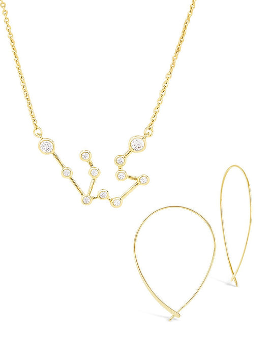 Gold constellation necklace and delicate threader earrings from Sterling Forever's When Stars Align set, featuring celestial jewelry.