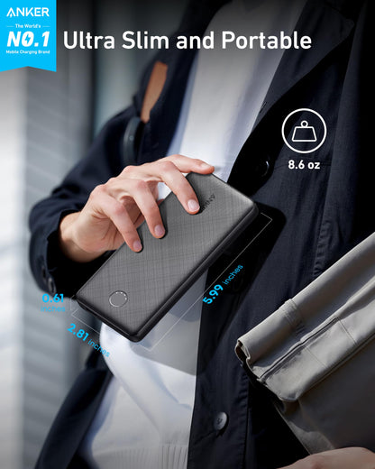 Anker 313 PowerCore 10K portable power bank in black, compact charging device with dual USB ports for mobile device charging.