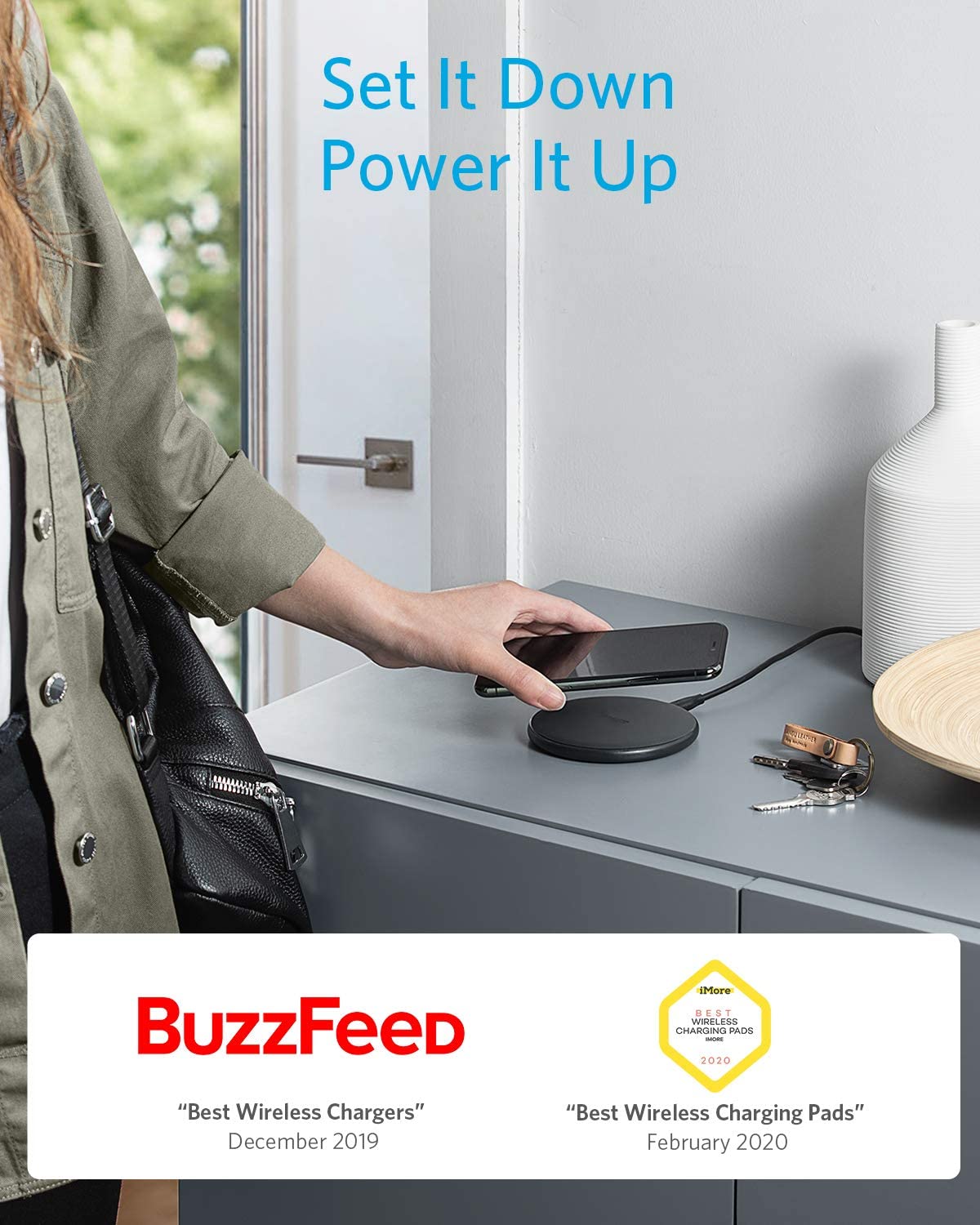 Anker 313 wireless charging pad in black for charging compatible smartphones wirelessly on a smooth surface.