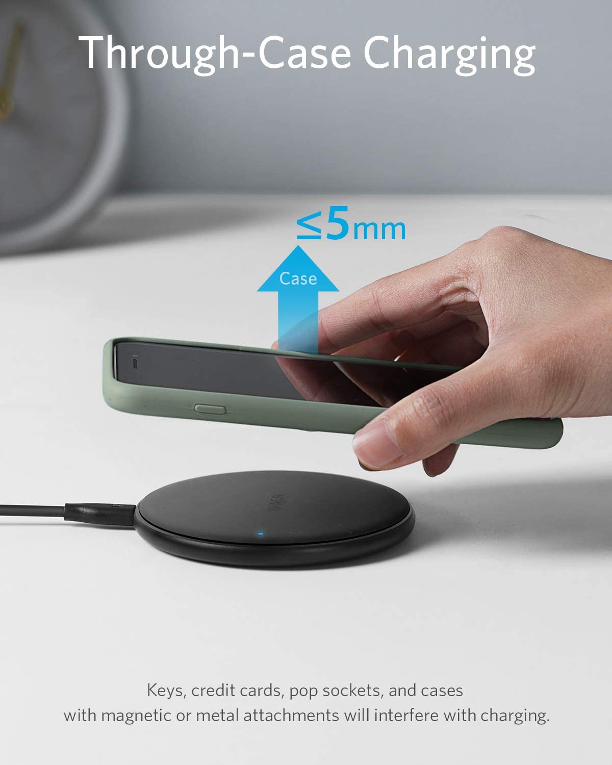 Anker 313 wireless charging pad in black for fast, cable-free charging of compatible smartphones and devices.