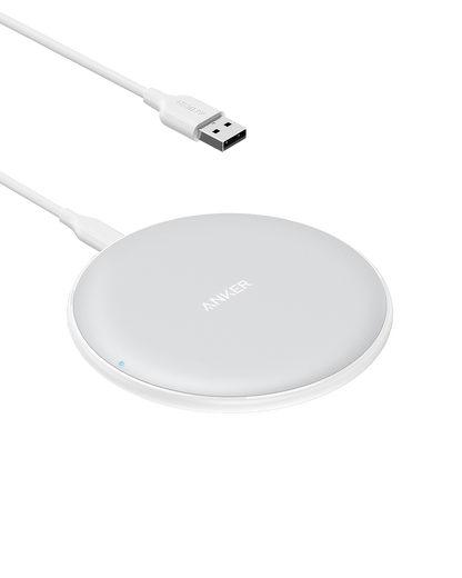 Anker 313 wireless charging pad in black for charging compatible devices quickly and conveniently.