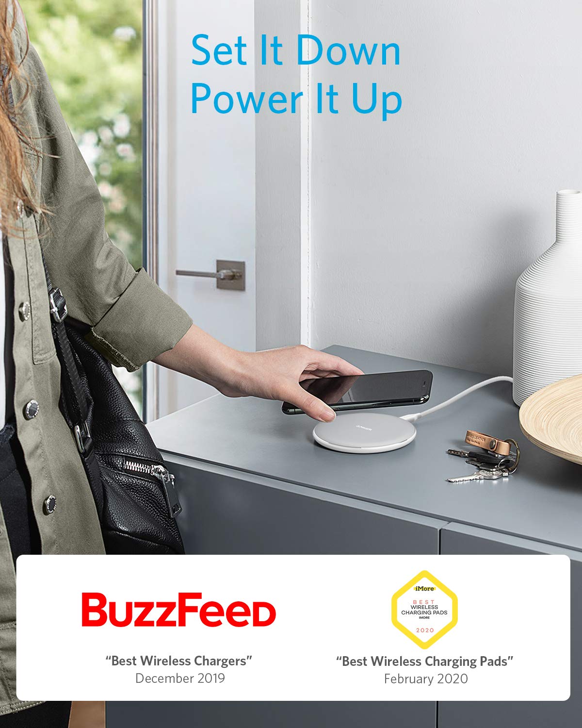 Black Anker 313 wireless charging pad for charging devices, slim and compact design for convenient wireless power.
