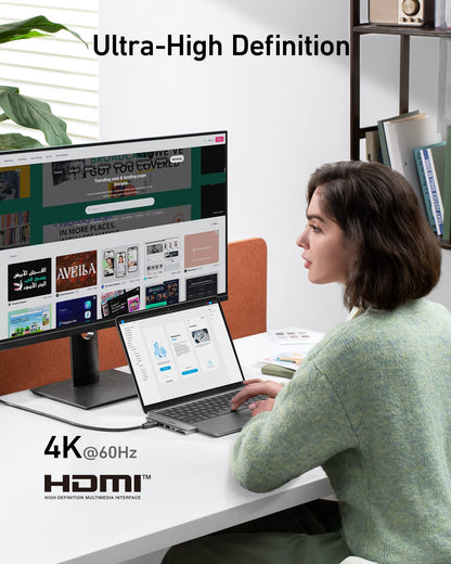 Anker 547 USB-C Hub for MacBook, charging-only 7-in-2 hub with multiple ports, shown connected to a MacBook.