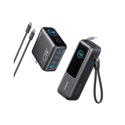 Anker 25K 165W laptop power bank in space black with built-in and retractable cables for portable charging.