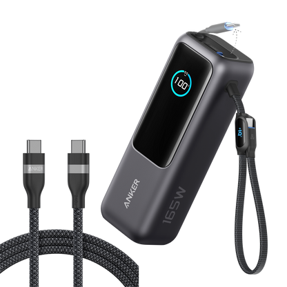 Anker 25K 165W laptop power bank in space black with built-in and retractable cables for portable charging.