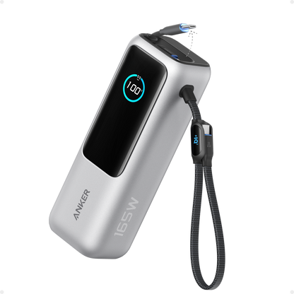 Anker 25K 165W laptop power bank in space black with built-in and retractable cables for portable charging.