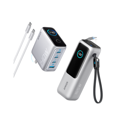 Anker 25K 165W laptop power bank in space black with built-in and retractable cables for portable charging.