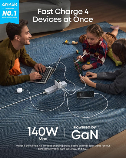 Anker 25K 165W laptop power bank in space black with built-in and retractable cables for portable charging.