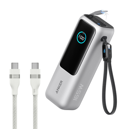 Anker 25K 165W laptop power bank with built-in, retractable cables in space black for portable device charging.