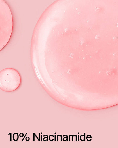 ANUA Niacinamide 10%+TXA 4% dark spot correcting serum in a clear glass bottle with a pump dispenser, labeled with product details.