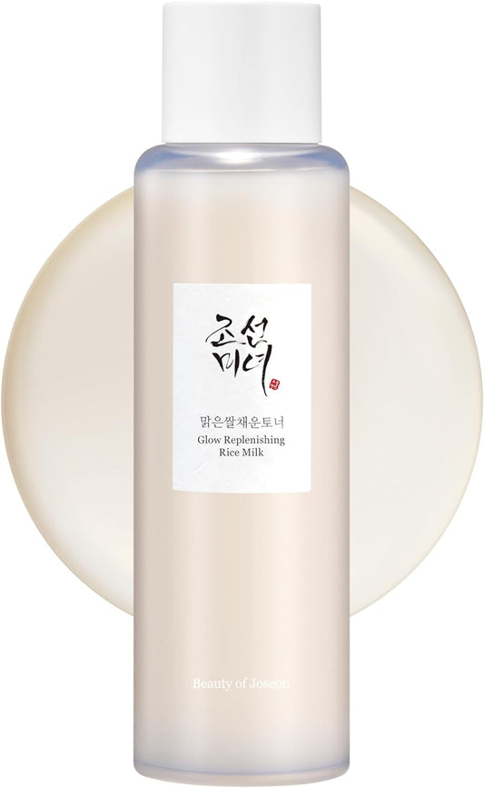 Beauty Of Joseon Glow Replenishing Rice Milk toner lotion in a clear bottle with white label and silver cap, skincare product for brightening