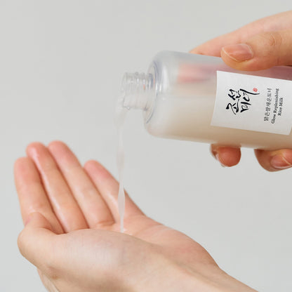 Beauty of Joseon Glow Replenishing Rice Milk toner lotion in a clear bottle with rice milk formula and natural ingredients.