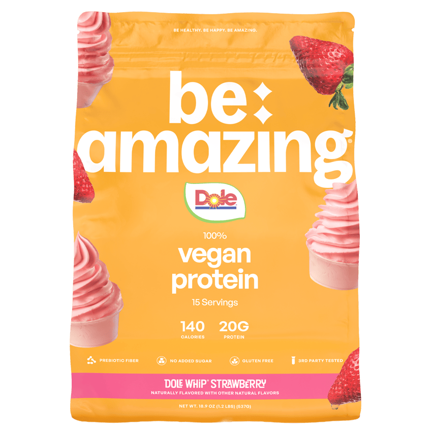 Be Amazing vegan protein powder in Dole Whip Strawberry flavor, 25 servings, with a scoop and packaging visible.