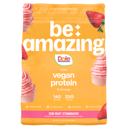Be Amazing vegan protein powder in Dole Whip Strawberry flavor, 25 servings, with a scoop and packaging visible.