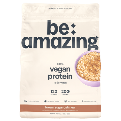 Be Amazing vegan protein powder with Dole Whip Strawberry flavor, showing the colorful packaging and serving size details.