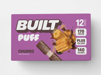 BUILT Churro Puff, a baked snack with crispy texture and cinnamon sugar coating, in a close-up view.