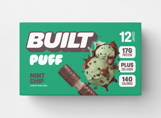 BUILT Puff Mint Chip Puff with a soft, mint-flavored filling inside a crispy snack shell.