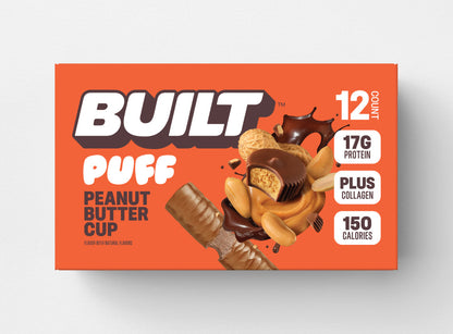 BUILT Peanut Butter Cup Puff, chocolate-coated snack with peanut butter filling, showing the puffy snack with a smooth chocolate exterior.