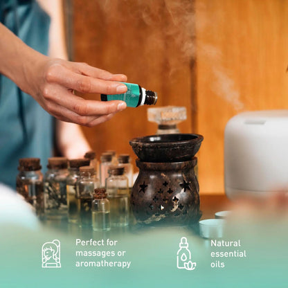 Assorted DC-PURSONIC aromatherapy essential oils in lavender, eucalyptus, and frankincense bottles arranged on a white surface