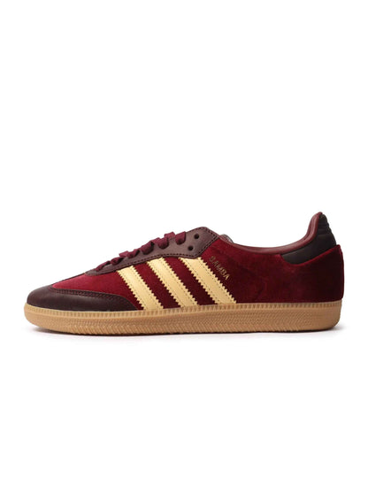 Adidas Women's Samba OG red velvet sneakers with classic design, showcasing the sleek red velvet upper and white rubber sole.