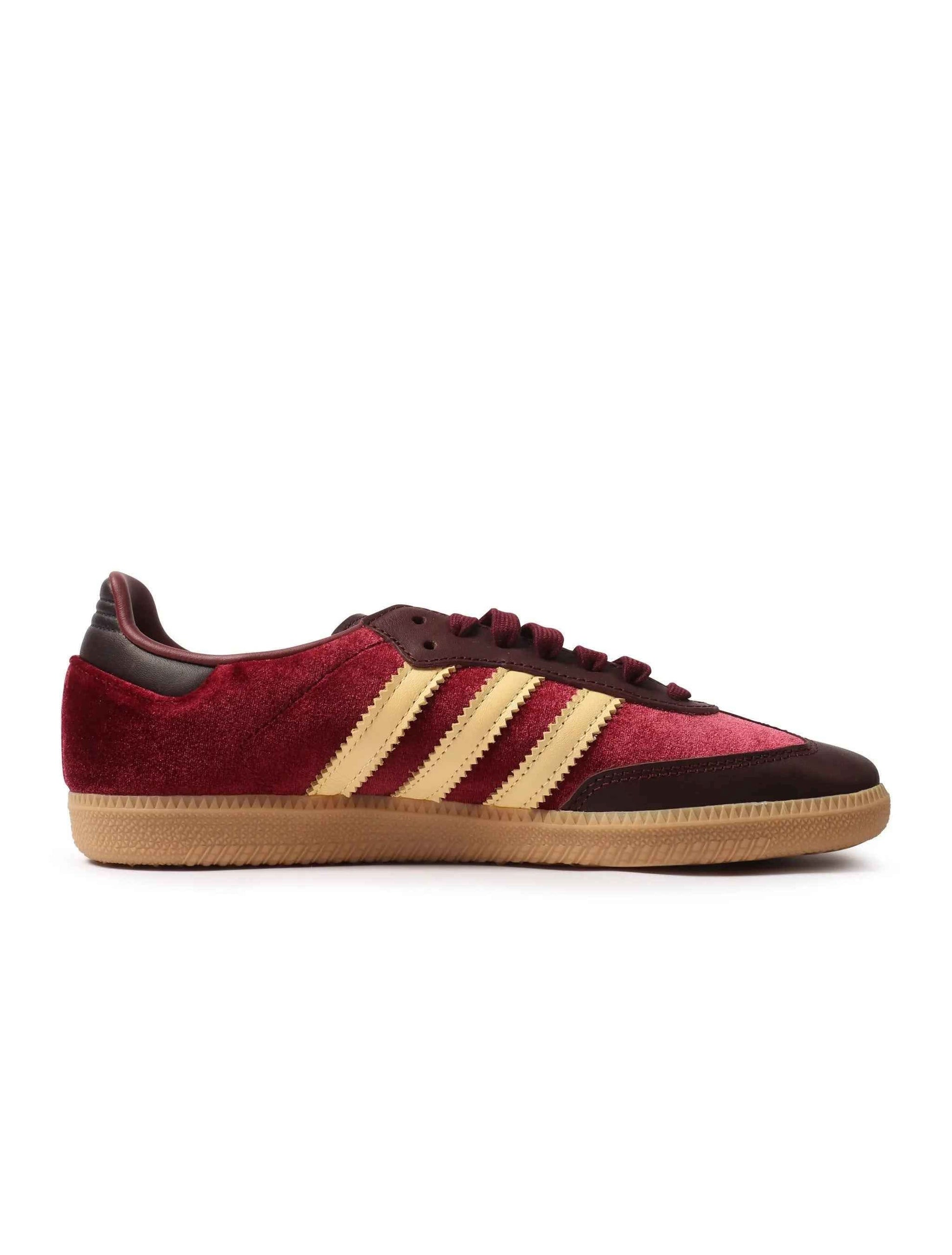 Red velvet Adidas Women's Samba OG sneakers, showcasing classic design and comfortable fit in a stylish footwear image.