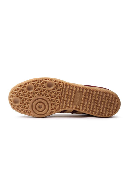 Red velvet Adidas women's Samba OG sneakers featuring classic design and white rubber soles, showcasing timeless style and comfort.