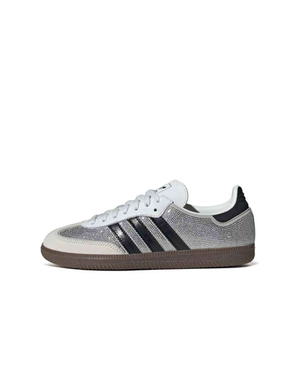 White Adidas Women's Samba OG sneakers with rhinestone accents, stylish footwear for women featuring classic design and branding.