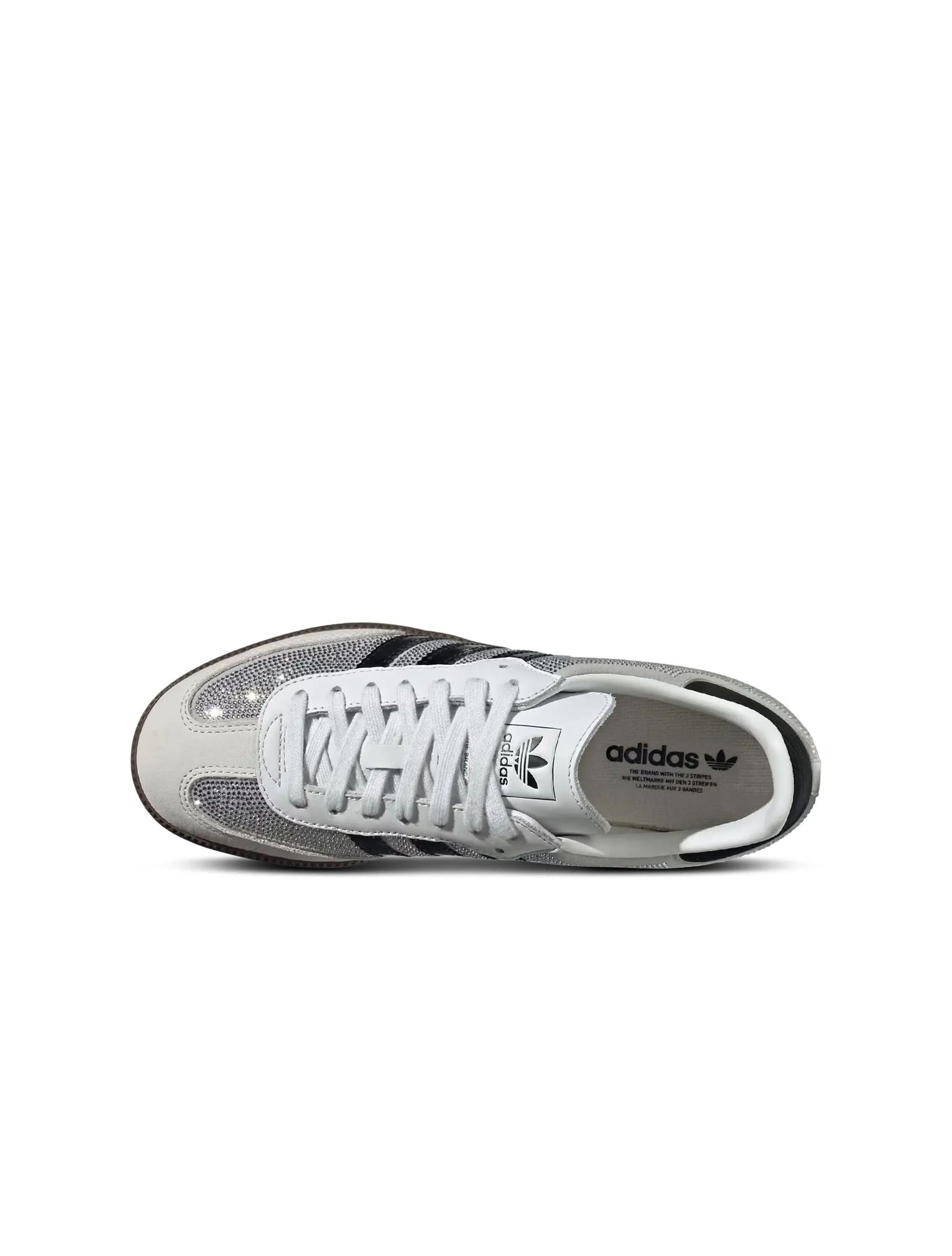 White Adidas Women's Samba OG sneakers with rhinestone details, showcasing classic footwear style and brand logo.