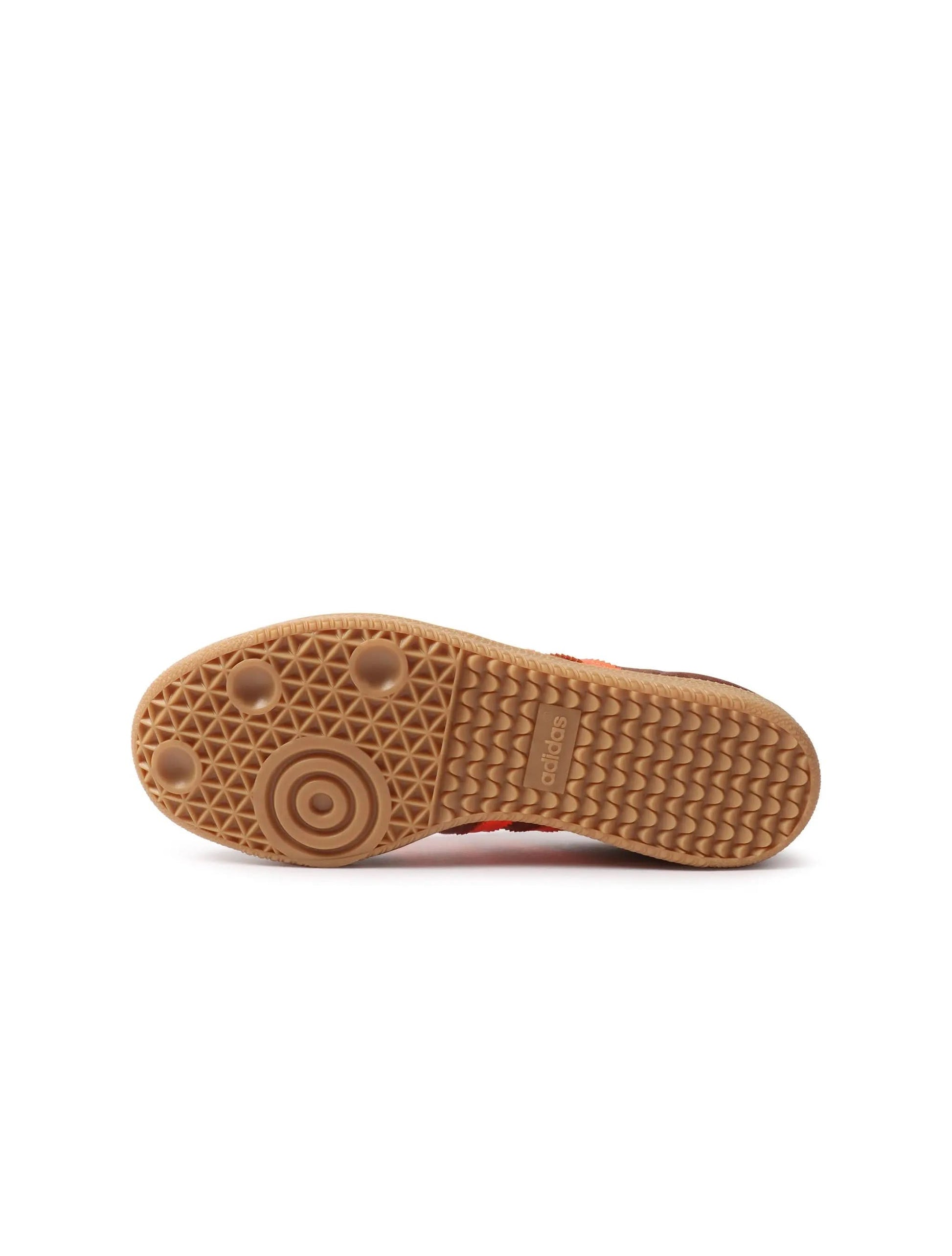 Adidas Samba women's sneakers in luxe brown with white accents, showcasing stylish footwear for women.