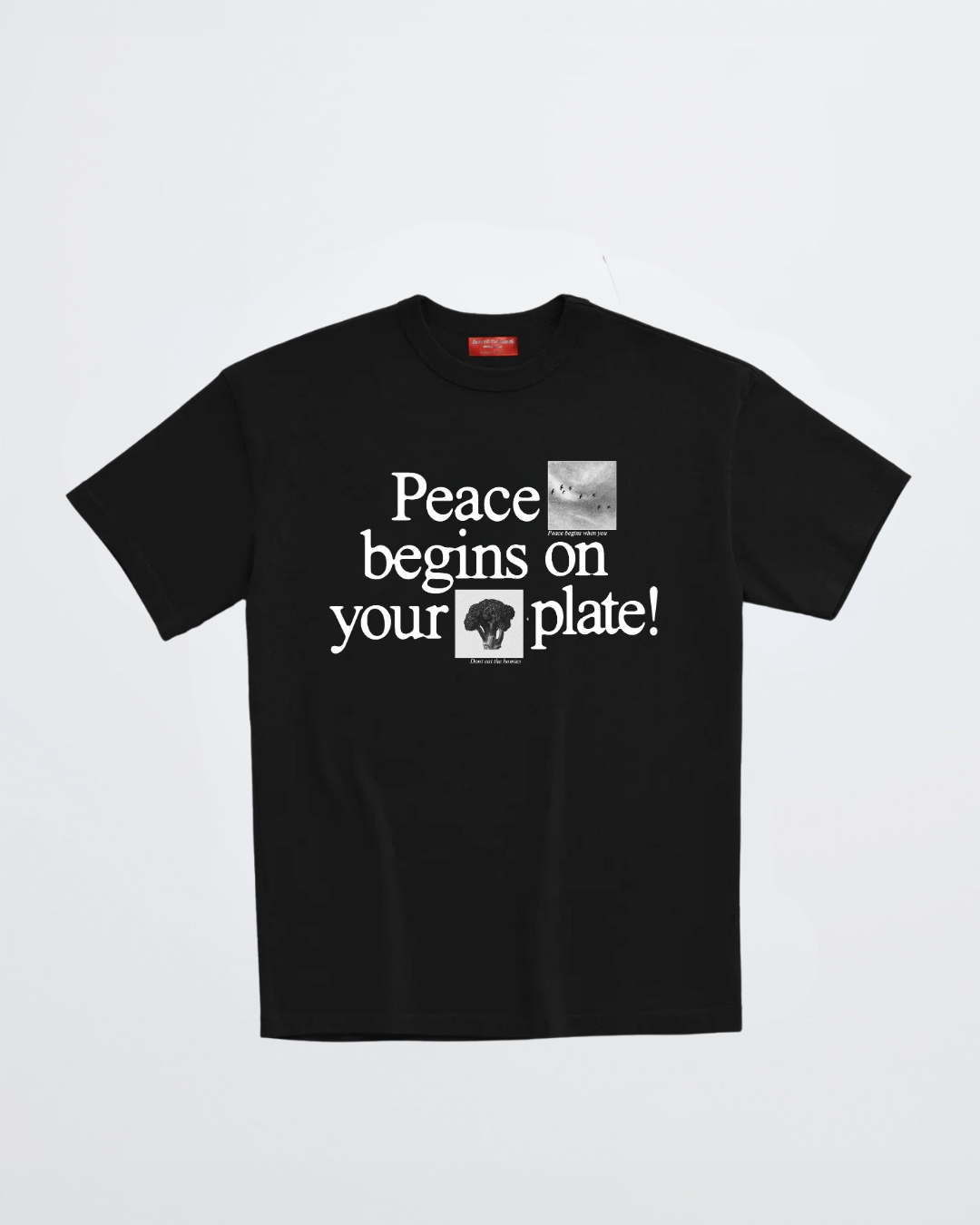 Don't Eat The Homies Peace Begins On Your Plate T-shirt featuring a casual design with the slogan in bold lettering.