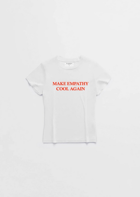 Don't Eat The Homies baby T-shirt with "Make Empathy Cool Again" slogan in black on soft cotton fabric.