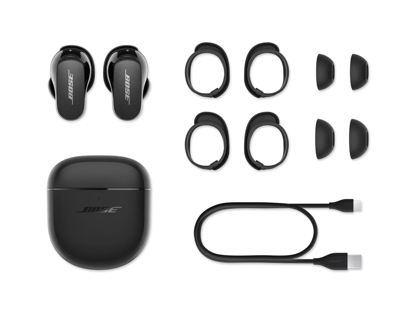 Black Bose QuietComfort Earbuds II in their charging case, designed for high-quality wireless audio and noise cancellation.