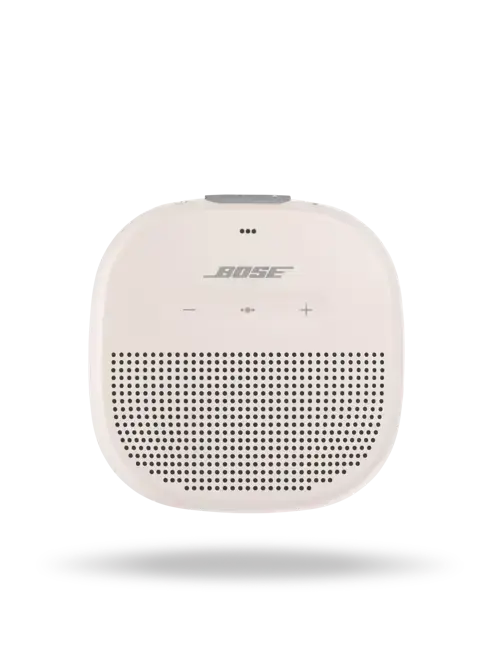 Black Bose SoundLink Micro Bluetooth speaker resting on a surface, compact portable design, with branding visible.