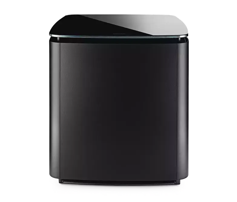 Black Bose Bass Module 700 speaker connected to a home audio system with a sleek design.