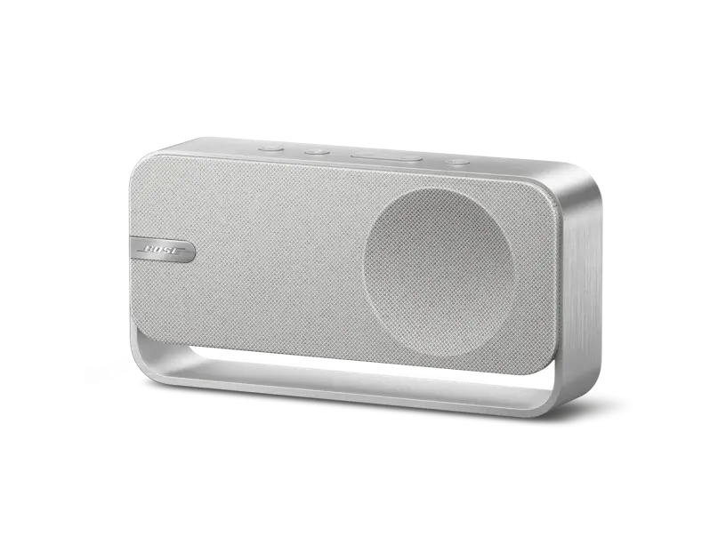 Enforce Records Bose SoundLink Home Bluetooth Speaker in light silver, compact wireless speaker with sleek design for quality sound.