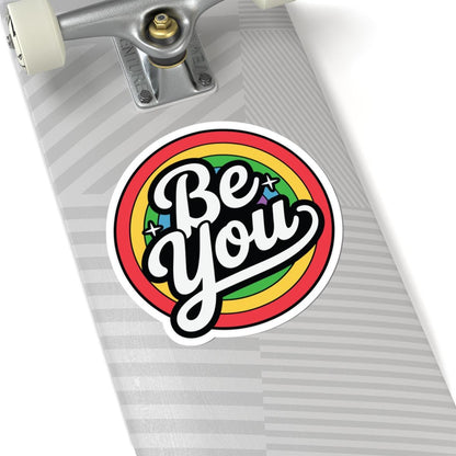 Glossy rainbow sticker with "Be You" message, perfect for LGBTQ+ pride vinyl decor, featuring vibrant colors and a glossy finish.