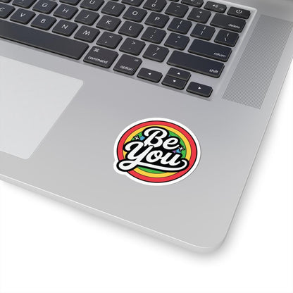 Glossy rainbow sticker with "Be You" message, LGBTQ+ pride vinyl decor, bright colors, and a shiny finish.