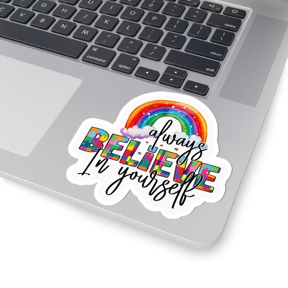 ColorFlow vinyl sticker with "Always Believe In Yourself" message, featuring rainbow puzzle design for autism pride and inspiration.