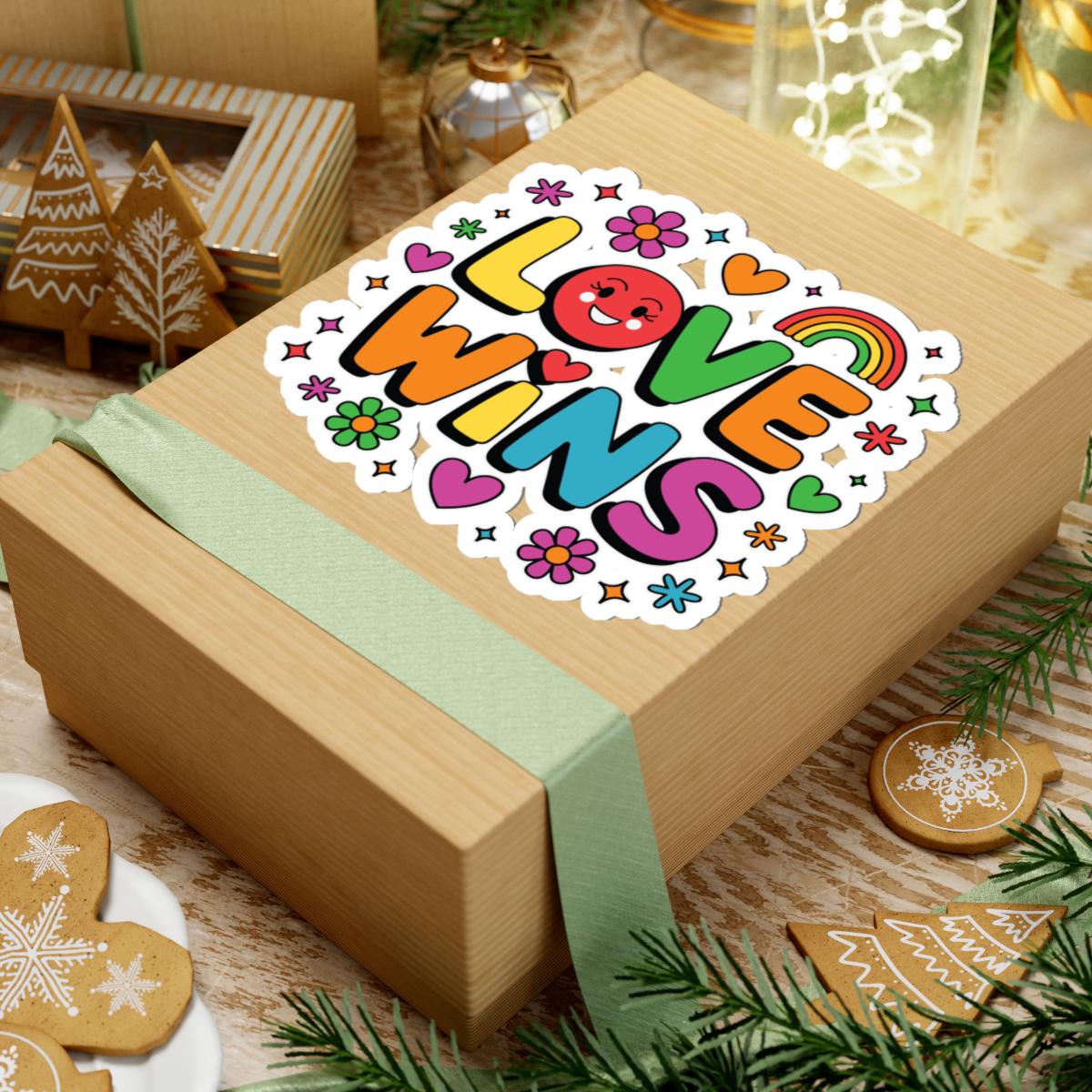 Love Wins LGBTQ Pride sticker featuring rainbow hearts and flowers, glossy vinyl decal with vibrant rainbow colors.