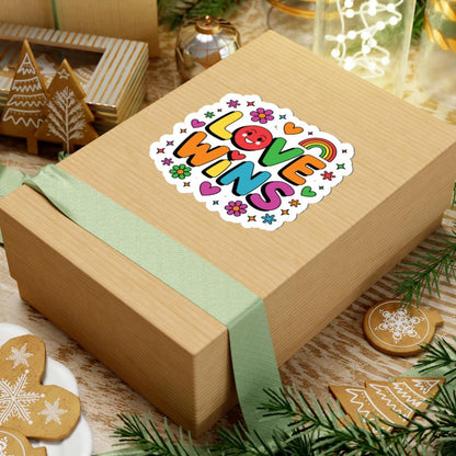 Rainbow hearts and flowers LGBTQ Pride sticker with "Love Wins" message, vinyl decal with glossy finish, perfect for decorating.