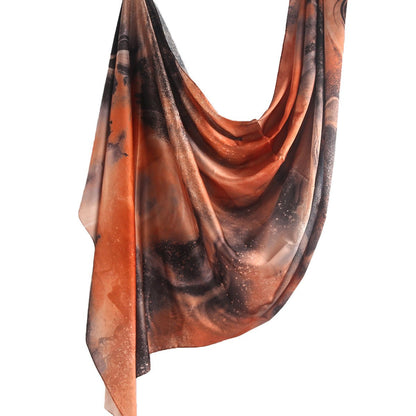Elegant satin marble print hijab from Mariam's Collection featuring a smooth satin fabric and stylish marble pattern.