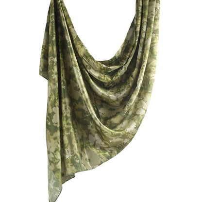 Elegant satin marble print hijab from Mariam's Collection, featuring a smooth, luxurious fabric with a stylish marble pattern.