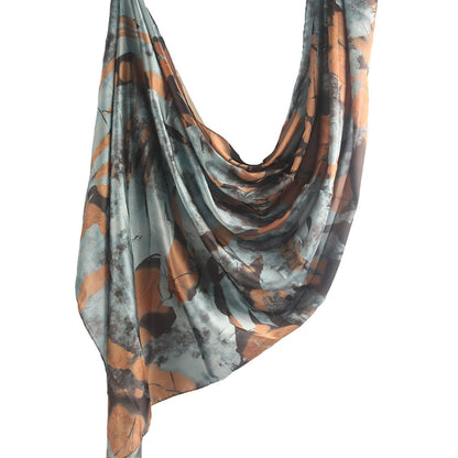 Mariams Collection satin marble print hijab in elegant design, featuring smooth satin fabric and stylish marble pattern.