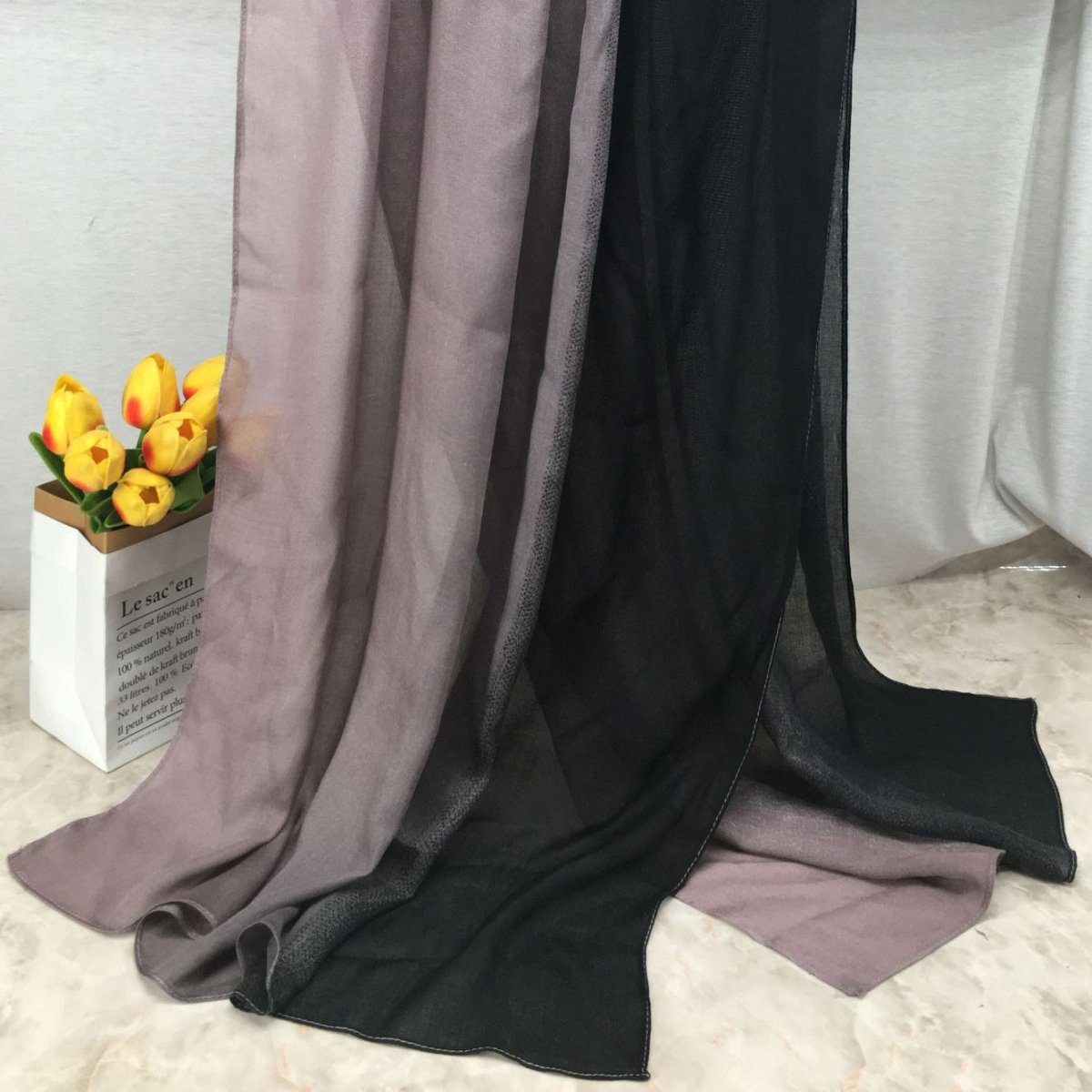 Lightweight, breathable gradient shawl hijab from Mariam's Collection, featuring soft fabric and stylish design.