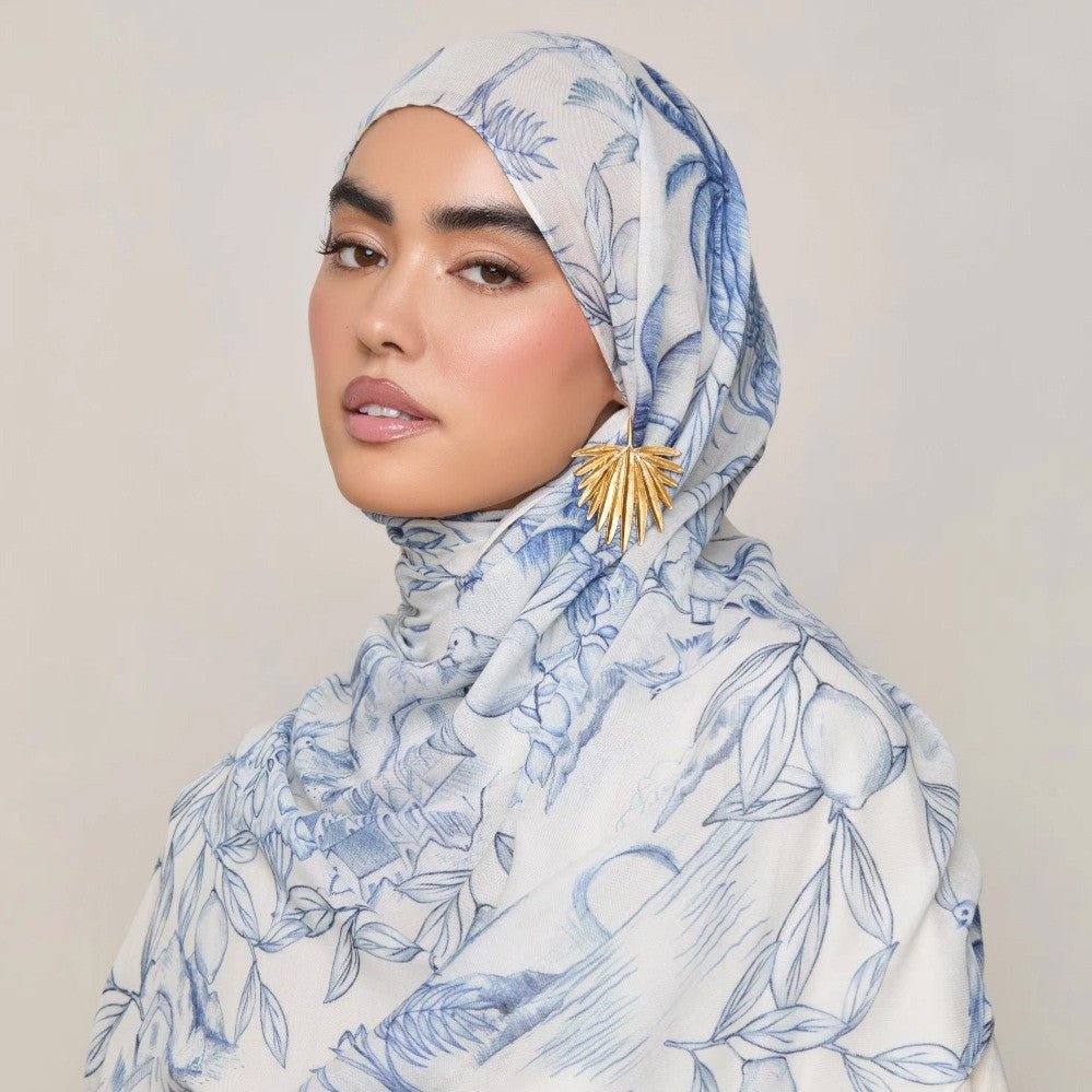 Watercolor print headscarf from Mariam's Collection, soft and breathable hijab in vibrant watercolor design, 180x70cm.