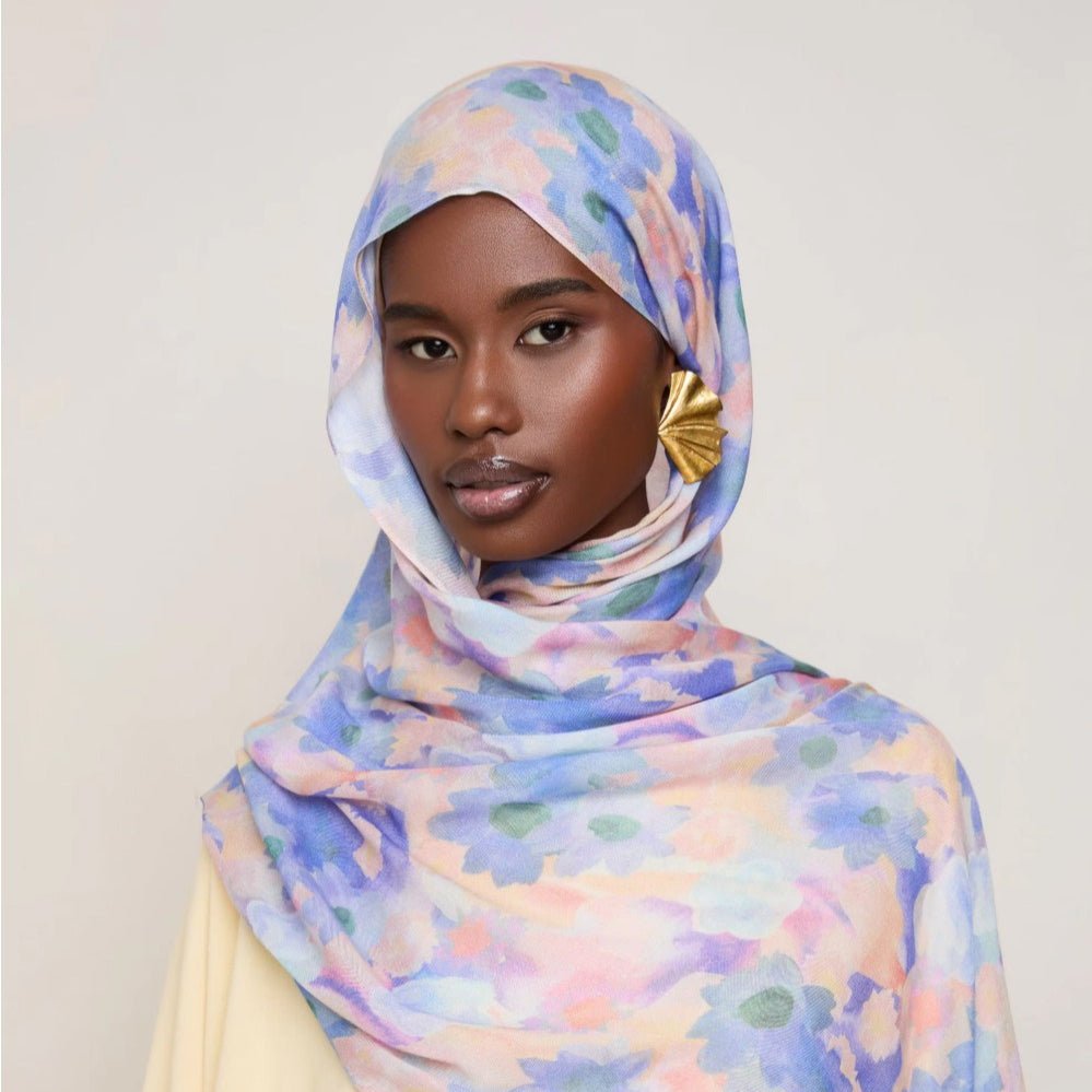 Vibrant floral print scarf hijab from Mariam's Collection, lightweight botanical headscarf in bright, colorful floral design.