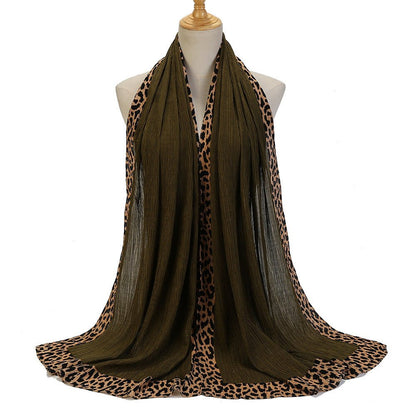 Black leopard-print crinkle hijab scarf with embellishments from Mariam's Collection, featuring solid color and lightweight fabric.