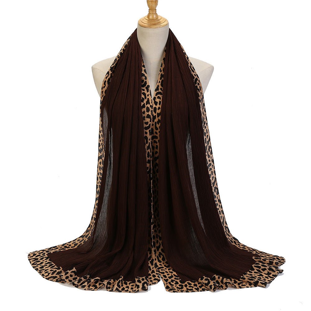 Black leopard-print embellished crinkle hijab scarf with solid color design from Mariam's Collection, 180cm length.