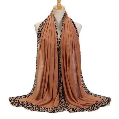 Black leopard-print embellished crinkle hijab scarf from Mariam's Collection, featuring a solid color and stylish design.