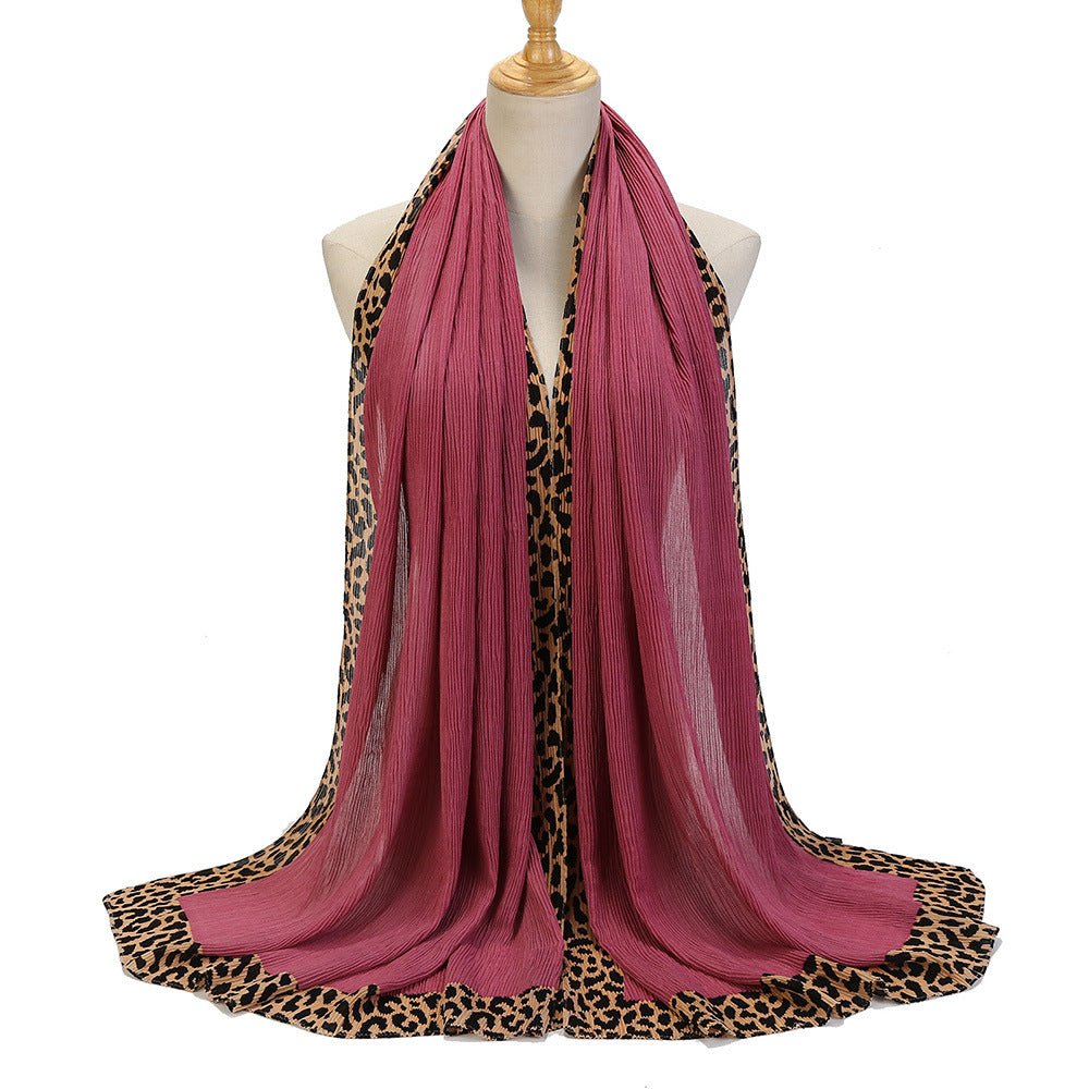 Black solid color leopard-print embroidered crinkle hijab scarf from Mariam's Collection, 180cm long with embellishments.